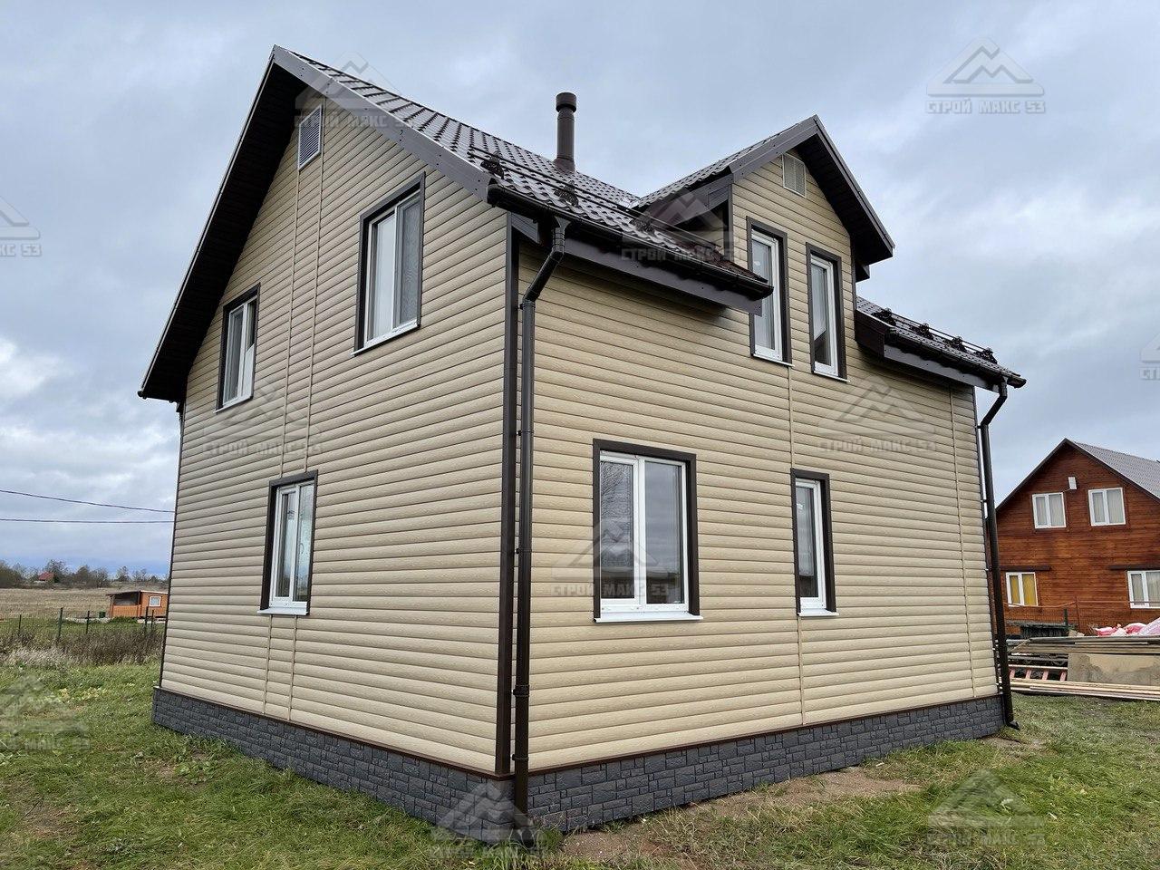 Смотреть Финский каркасный дом 128 м.кв. в деревне Высокое вид сзади